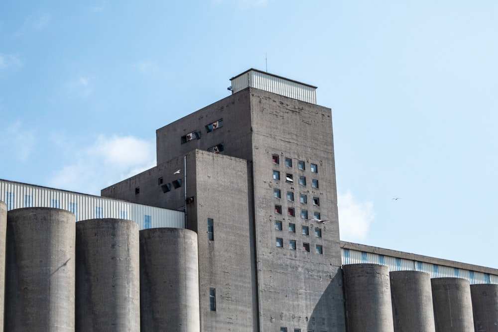 brown concrete building under blue sky during daytime