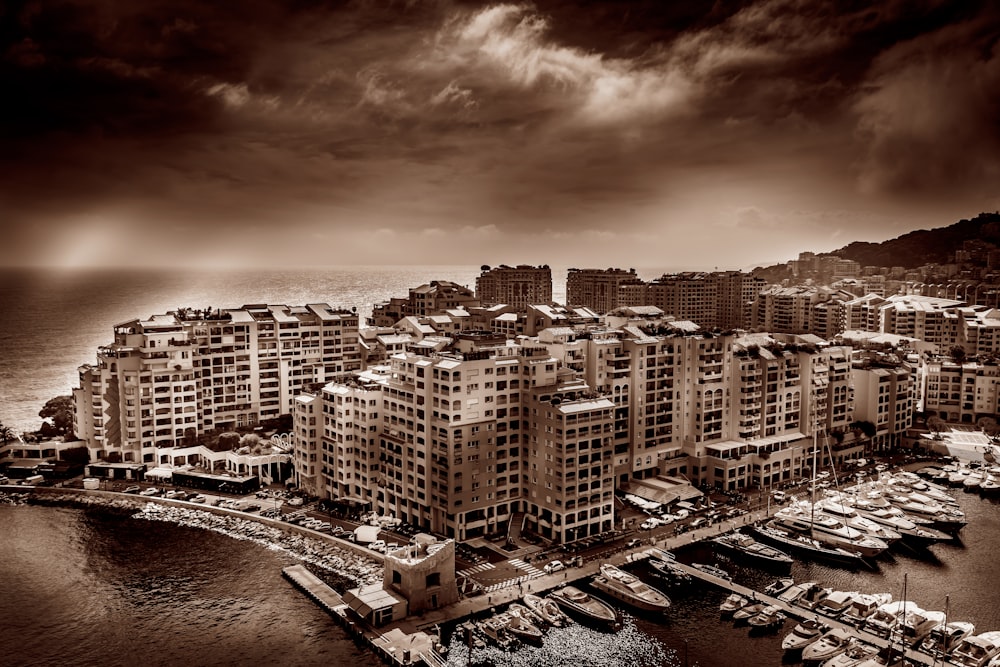 grayscale photo of city buildings