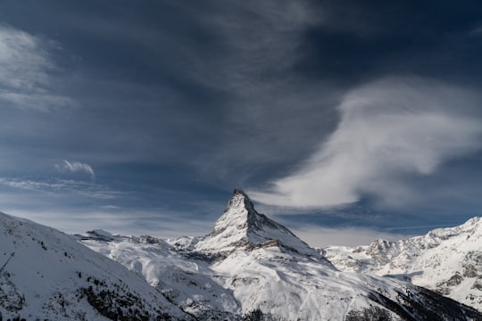 snow covered mountain under blue sky in Matterhorn Switzerland