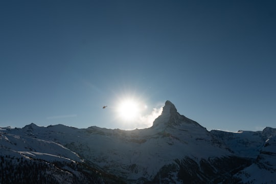 snow covered mountain under blue sky during daytime in Sunnegga Switzerland