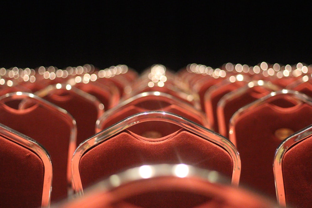 red and silver chairs with black background