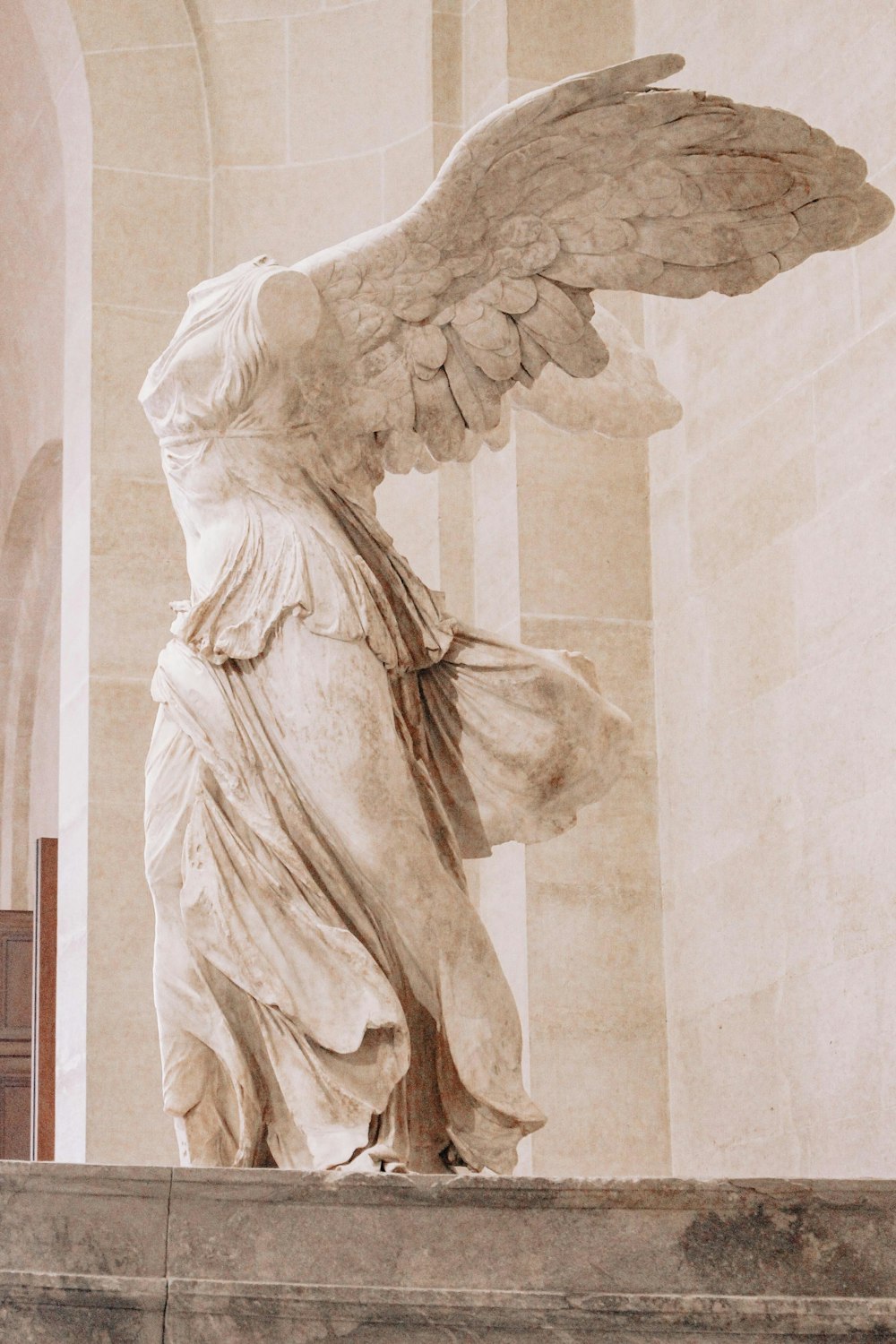 angel statue in white room