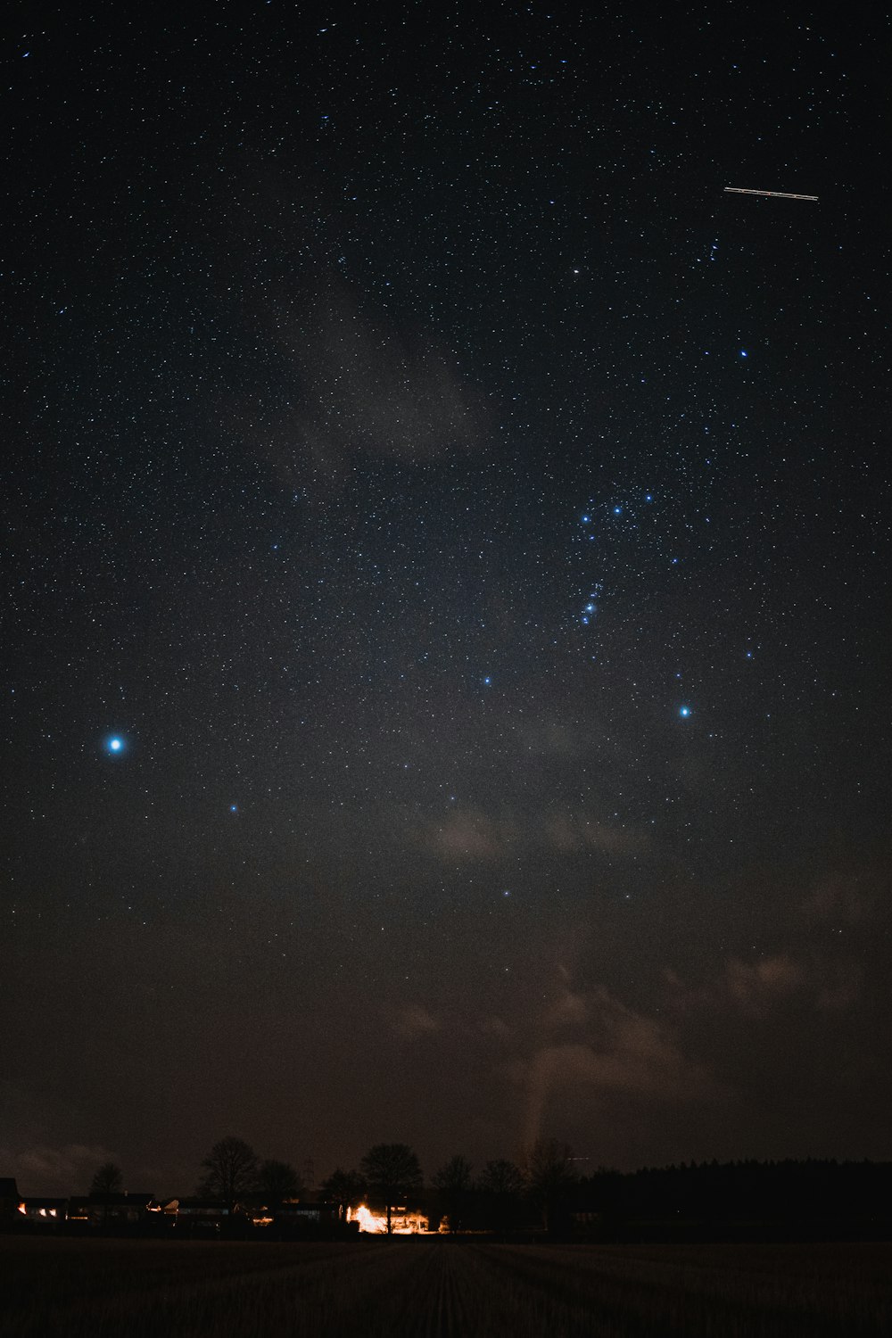 blue and black sky with stars during night time