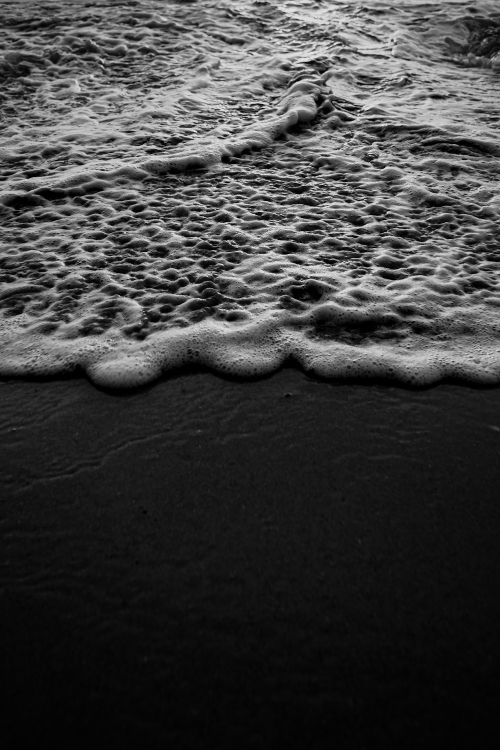 grayscale photo of sea waves