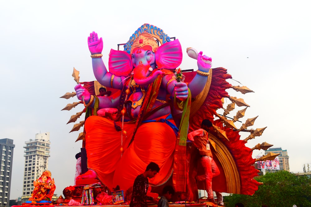 hindu deity statue under white sky during daytime