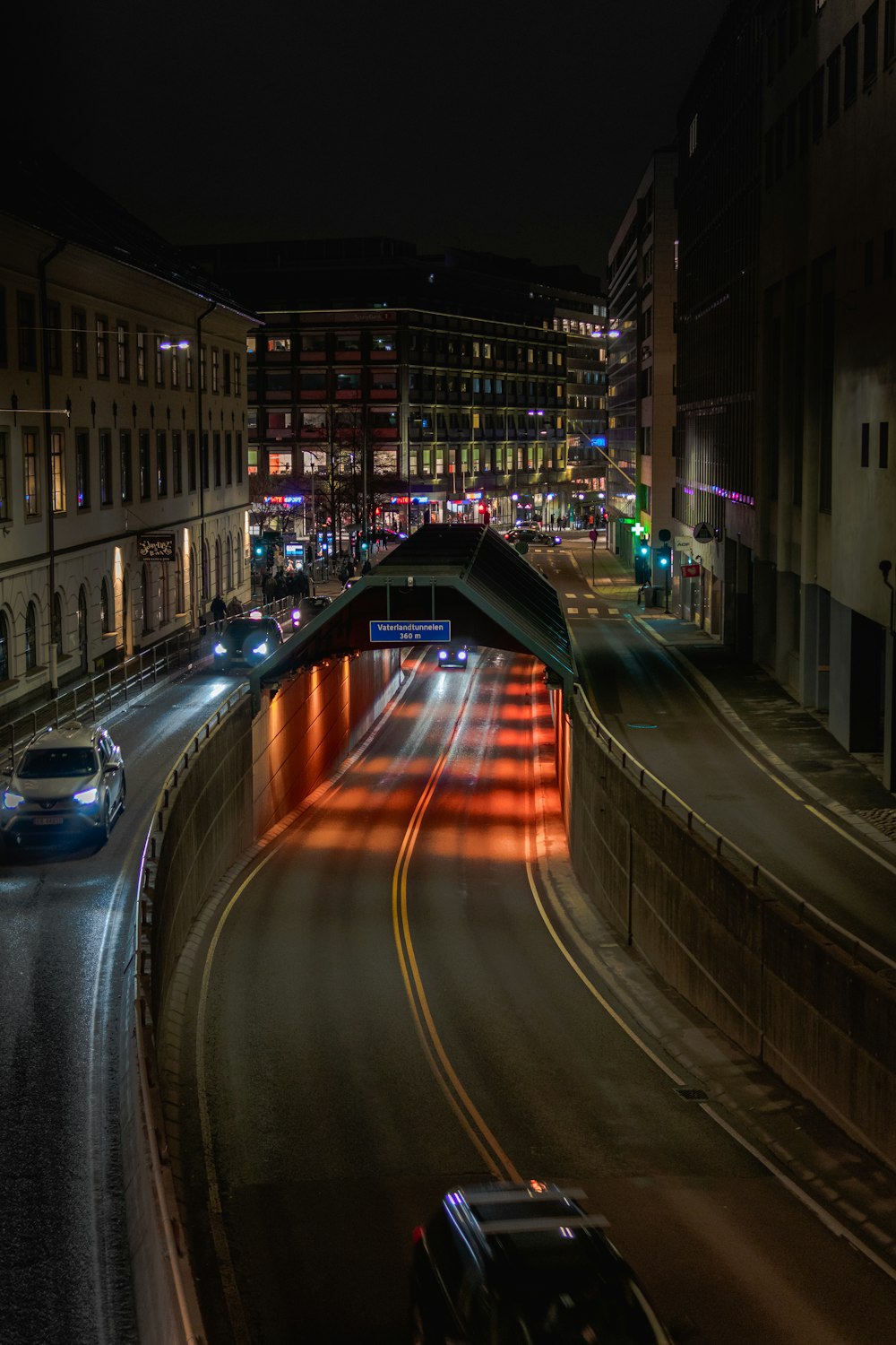 cars on road in city during night time