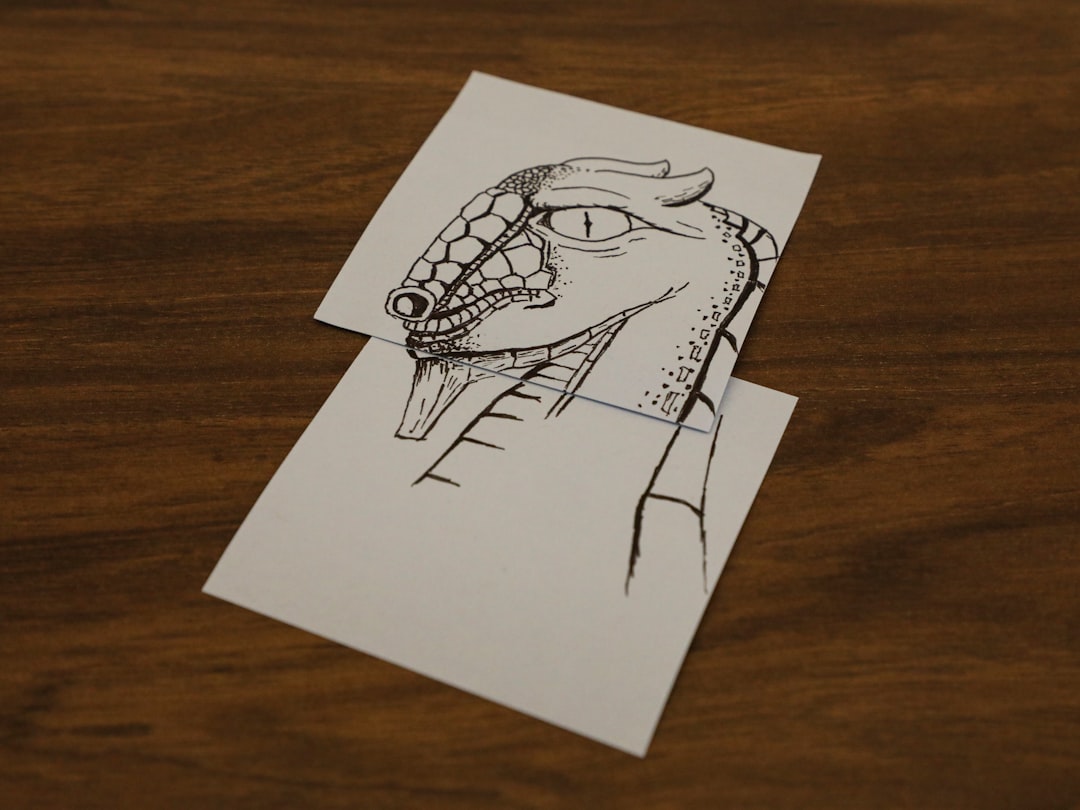 white printer paper on brown wooden table, You might find a dragon anywhere I suppose. I found one on post-its in one of my office conference rooms. A nice mixed media dragon on two overlapping post-its. Nice!