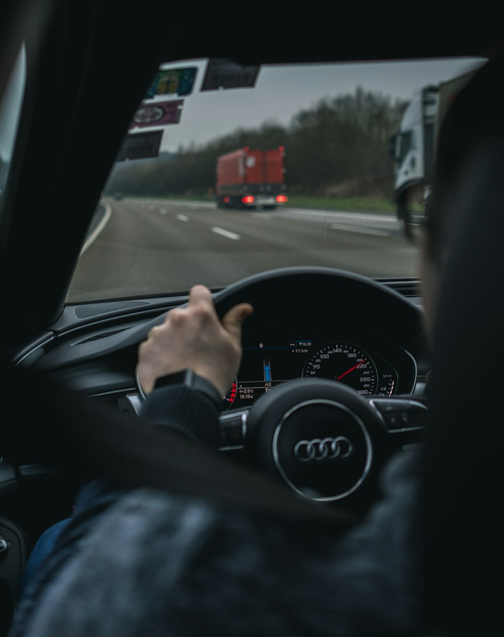 person driving car during daytime