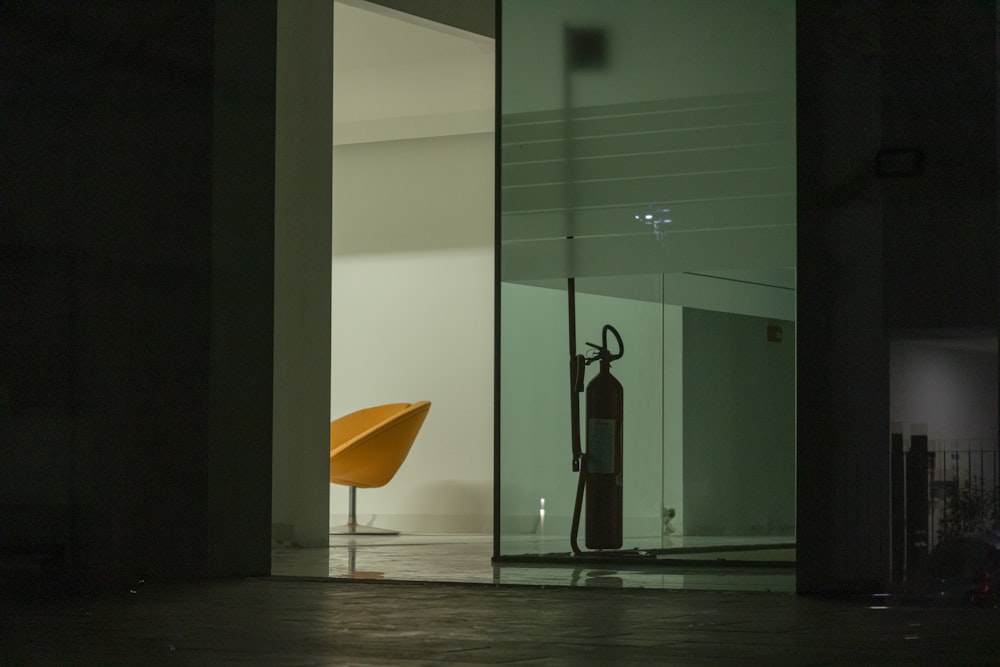 yellow umbrella on brown wooden floor