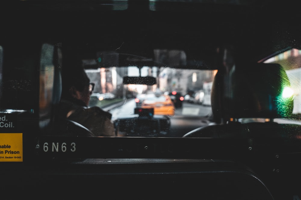 black car on road during daytime