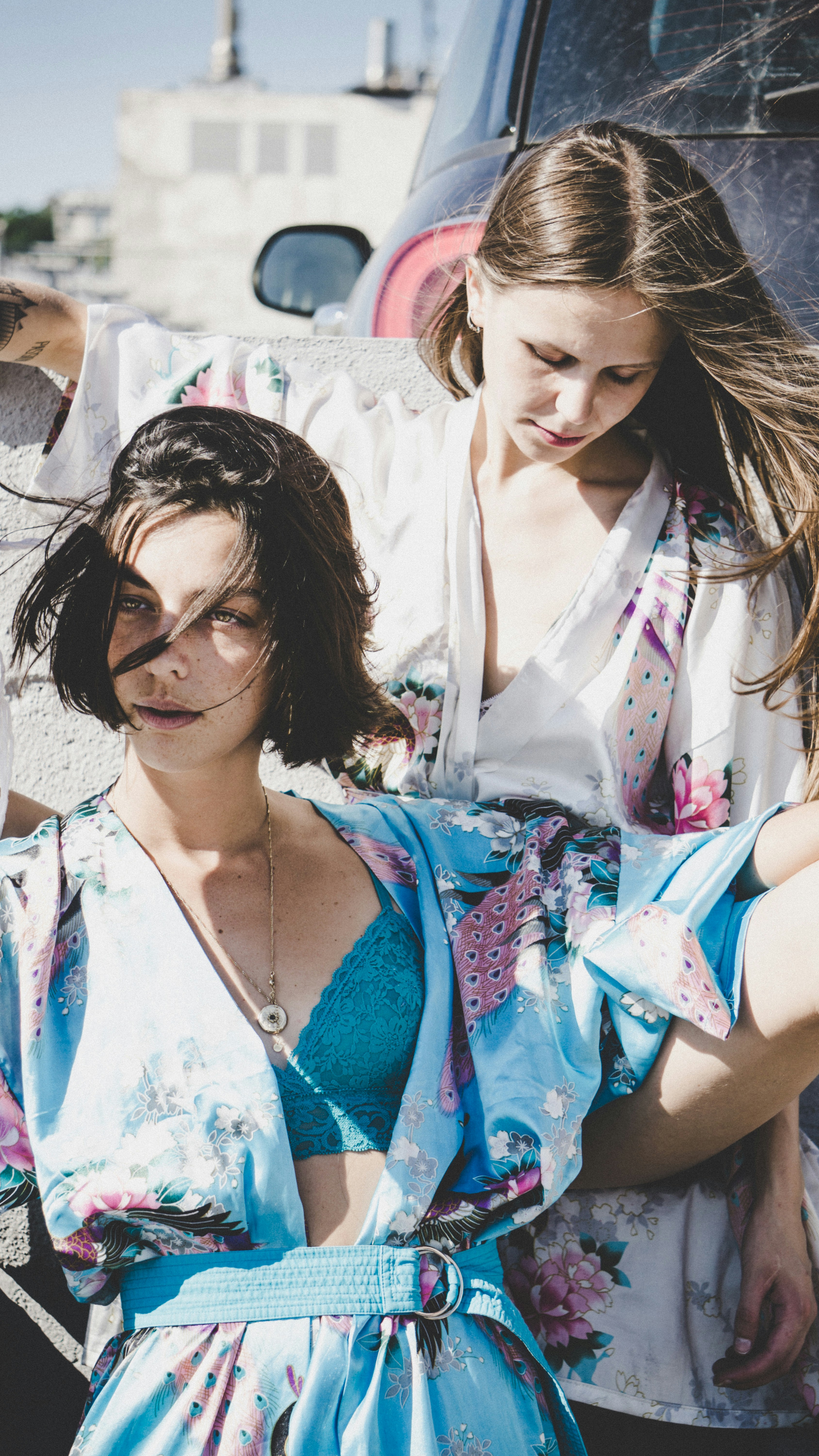 woman in white and blue floral button up shirt