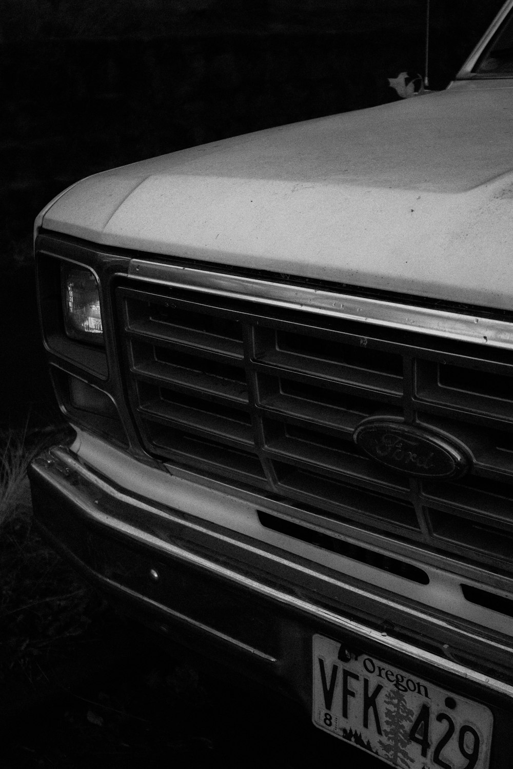 white car with white and brown snow