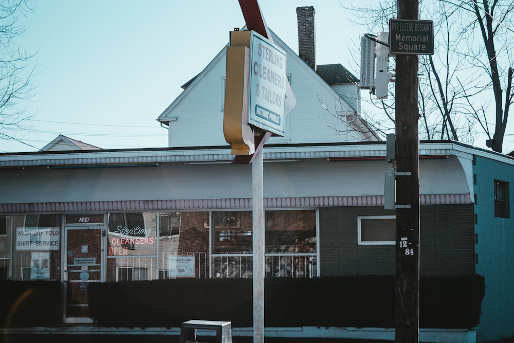 white and red street sign