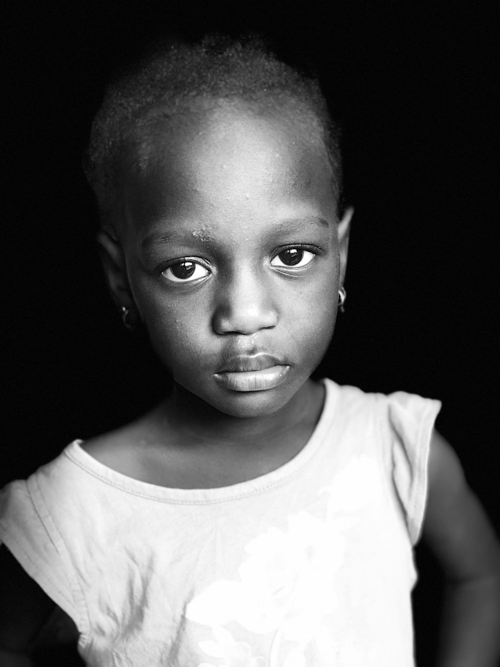 grayscale photo of girl in white crew neck t-shirt