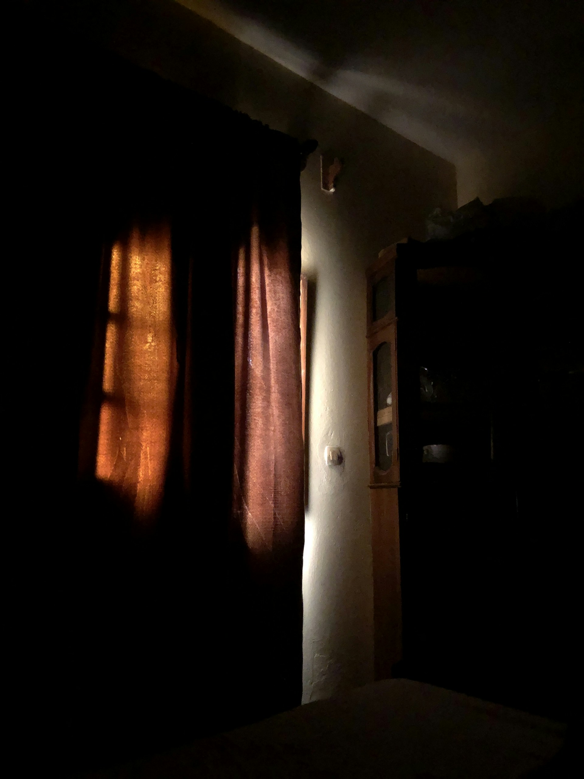 woman wearing yellow long-sleeved dress under white clouds and blue sky during daytime