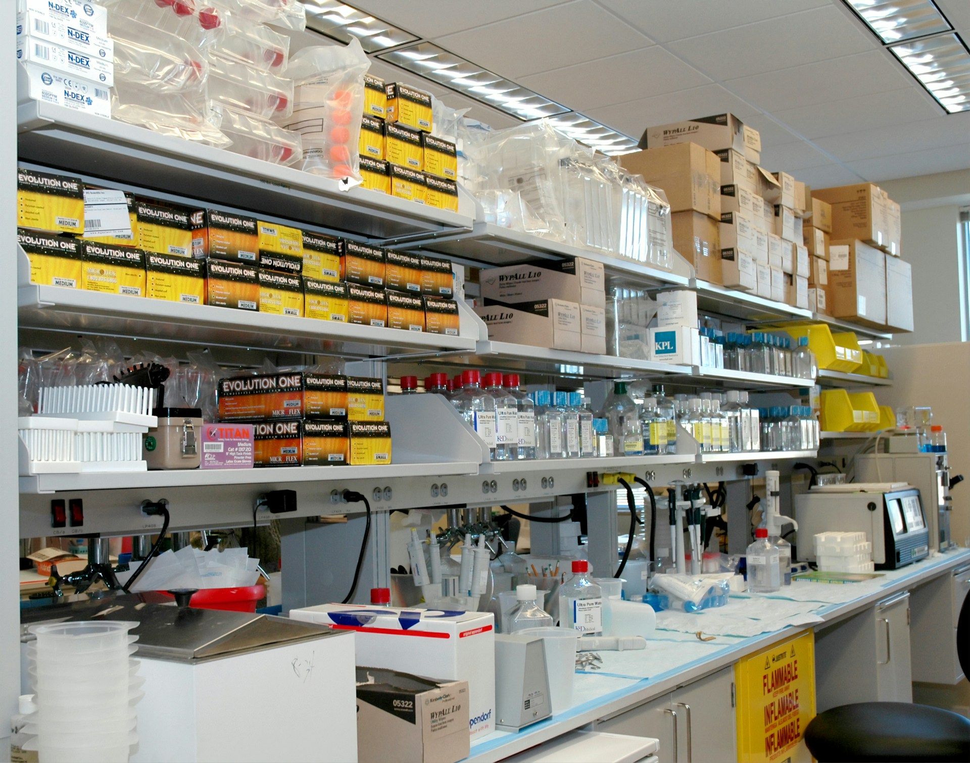 white wooden shelf with bottles and boxes