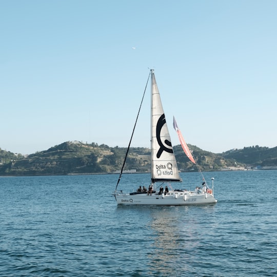 white sailboat on sea during daytime in Belém Portugal