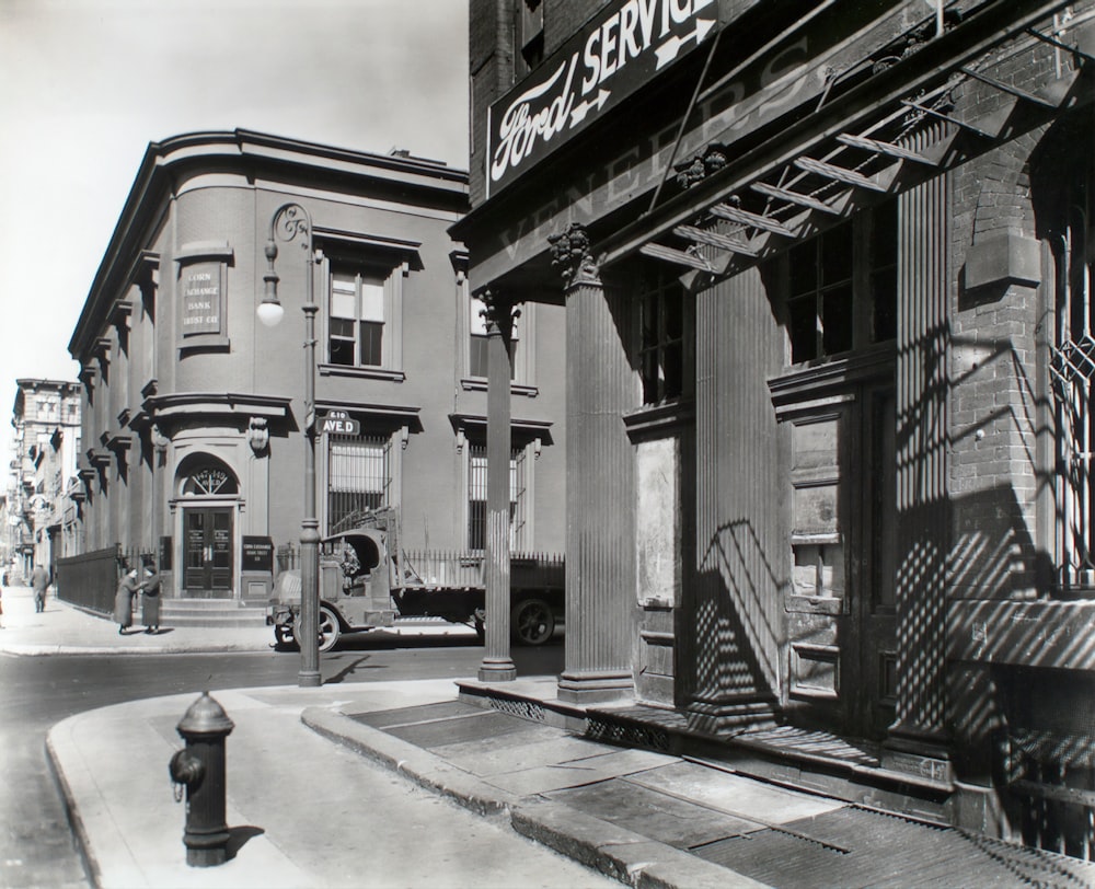 grayscale photo of building near road