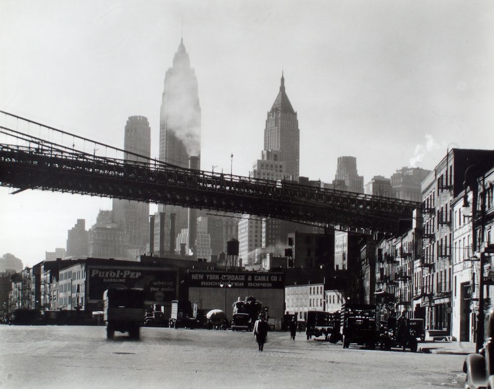 people walking on street near high rise buildings during daytime