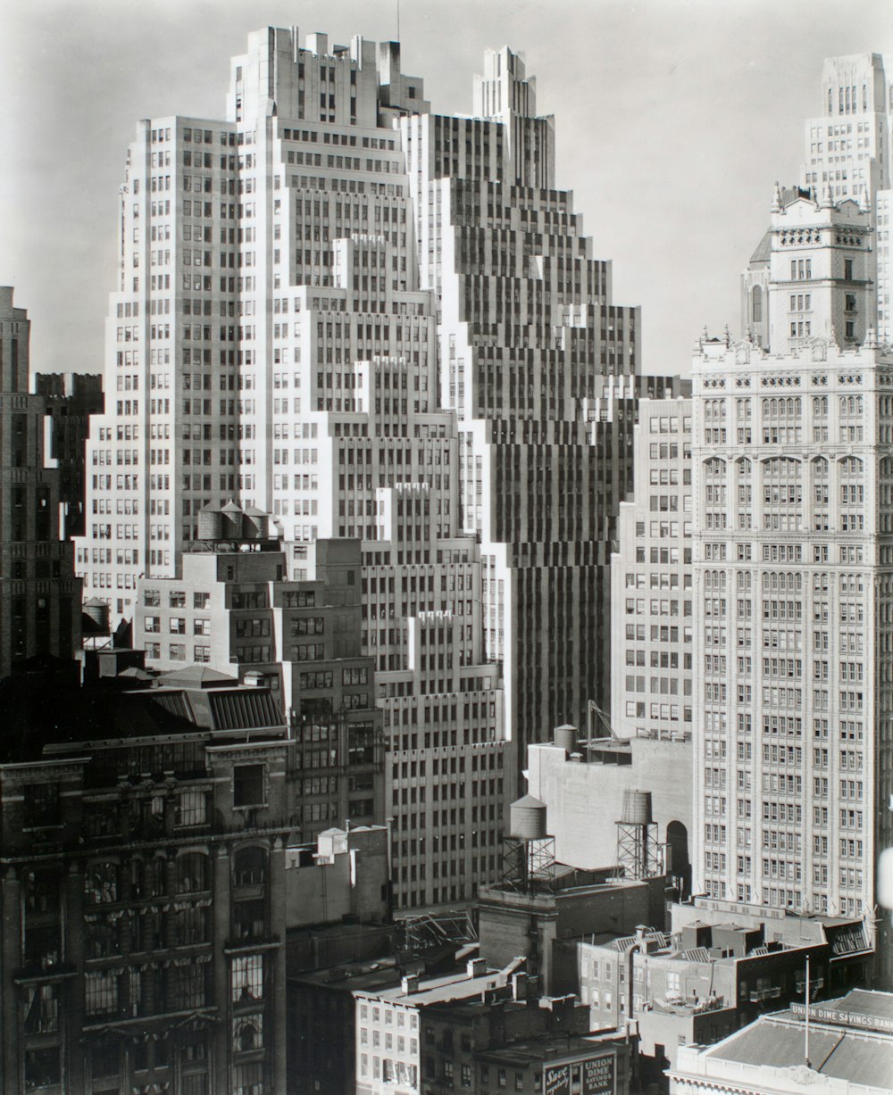 grayscale photo of city buildings