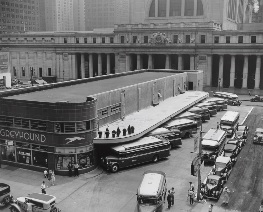 grayscale photo of cars on road