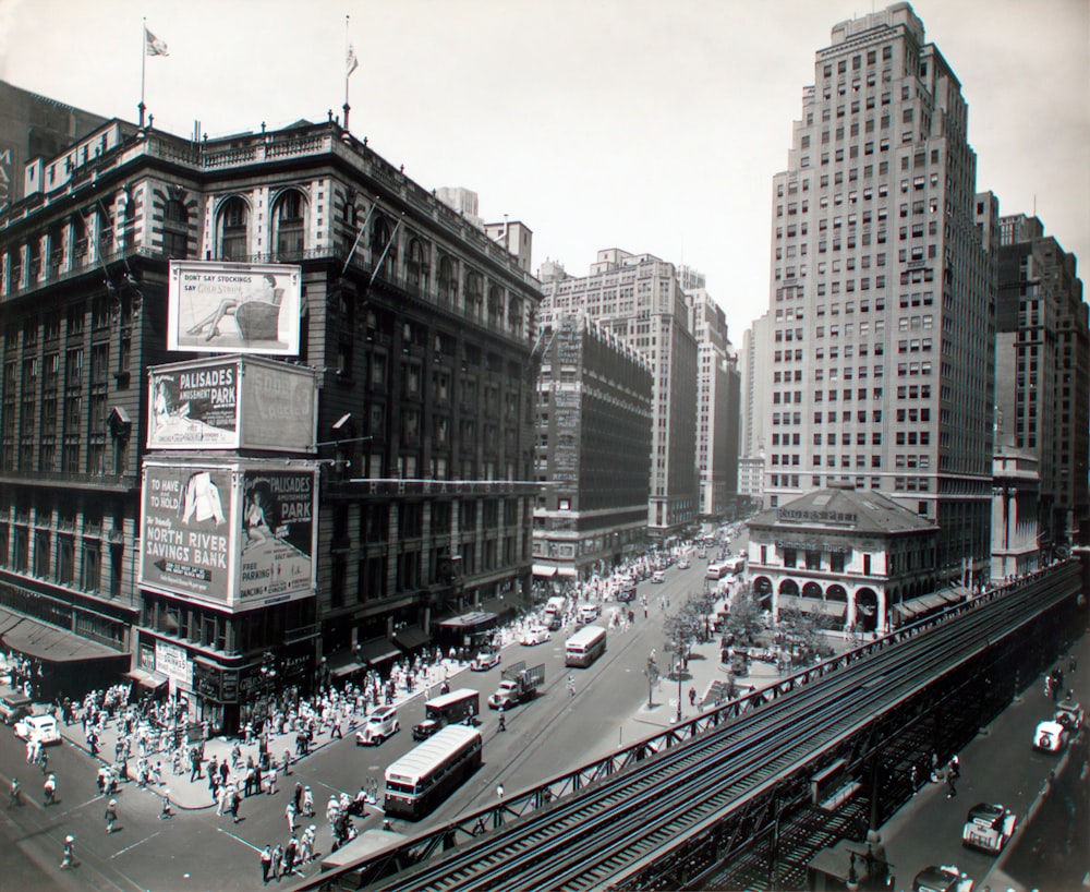 grayscale photo of city buildings in Manhattan