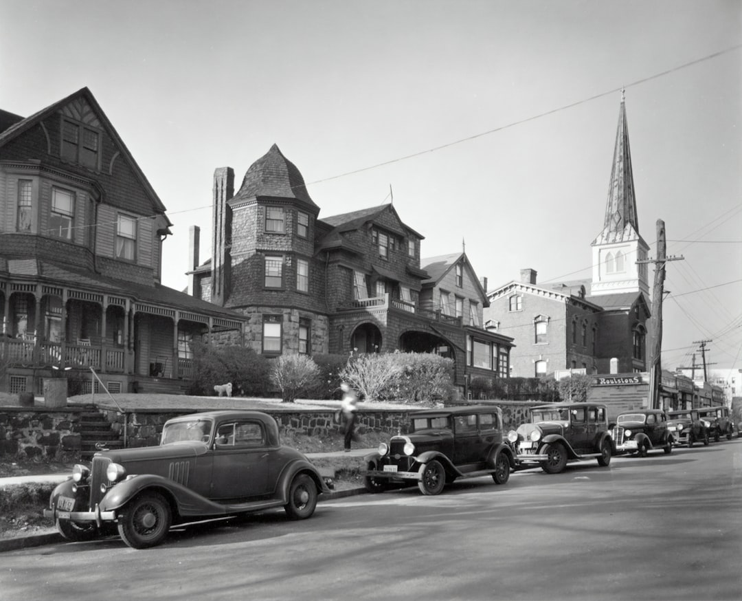 grayscale photo of cars parked near building in Staten Island