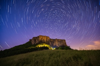 time lapse photography of stars in twilight sky