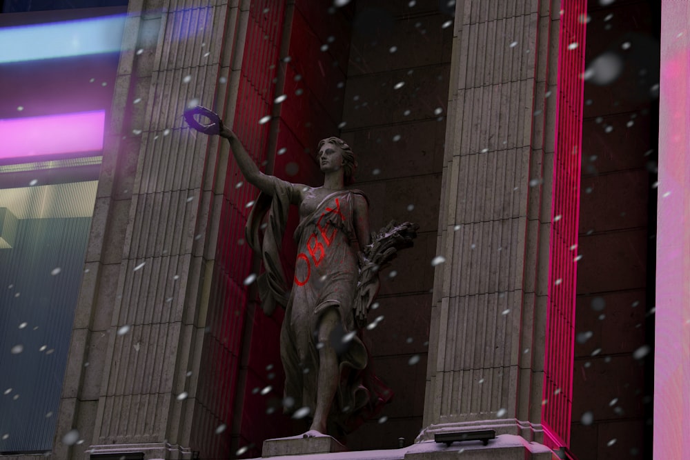 man in black suit statue