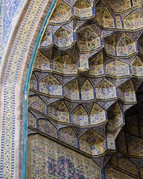 A close-up of intricate Moroccan zellige tile patterns showcasing their artistry.