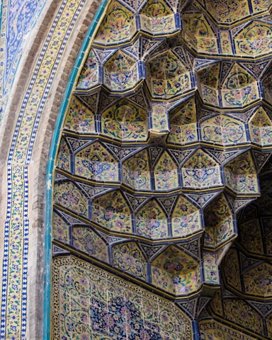A close-up of intricate Moroccan zellige tile patterns showcasing their artistry.