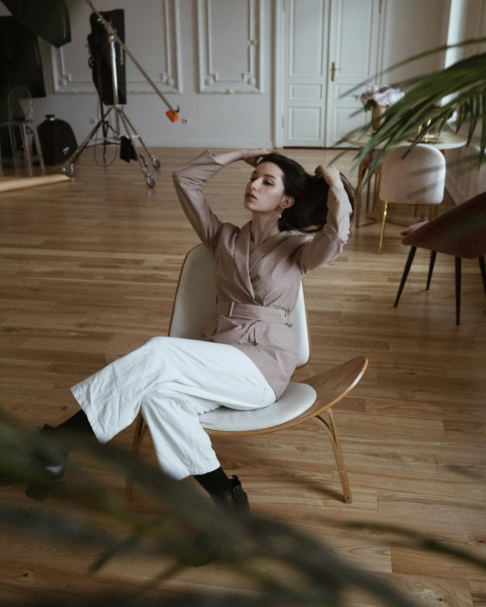 woman in white dress sitting on white chair