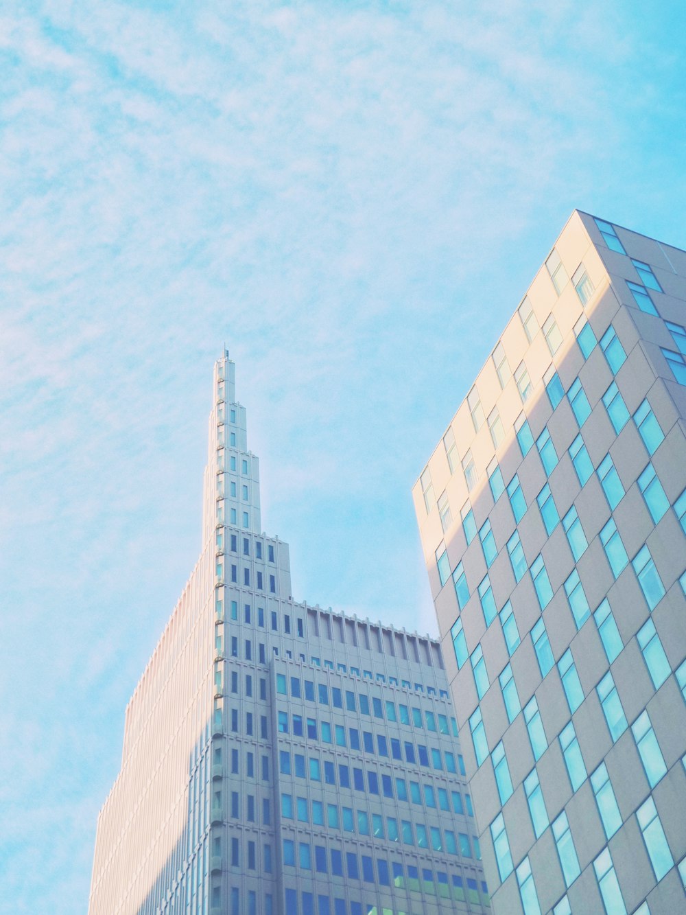 brown concrete building under blue sky during daytime