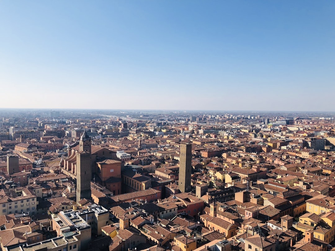 aerial view of city buildings during daytime, Two towers<p></figure>Shot on iPhone X.
