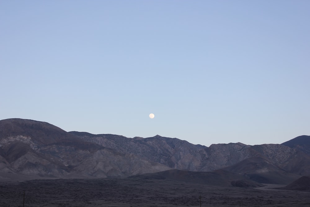 brown mountains under white sky during daytime