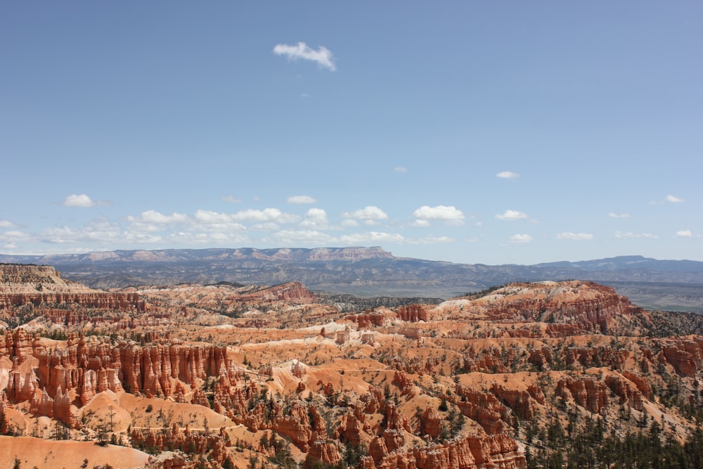 brown mountains under blue sky during daytime