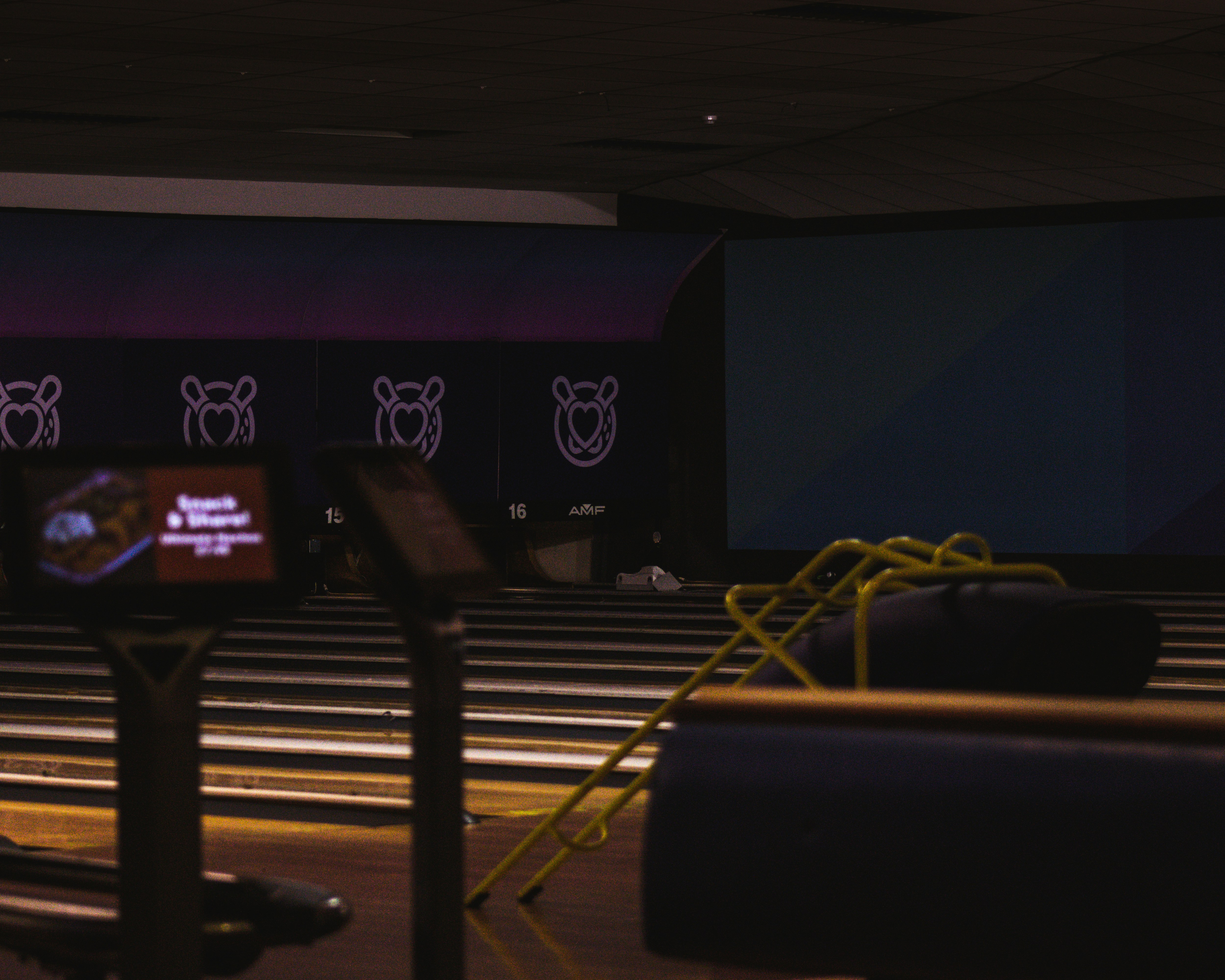 black flat screen tv turned on displaying a game