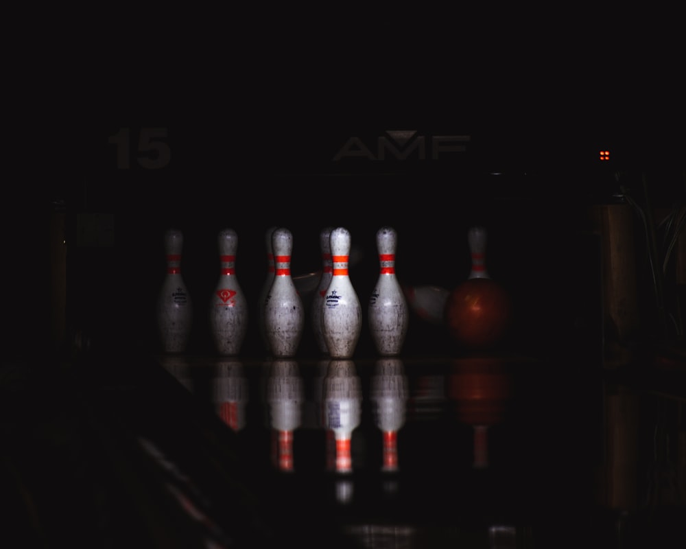 clear glass bottles on brown wooden table