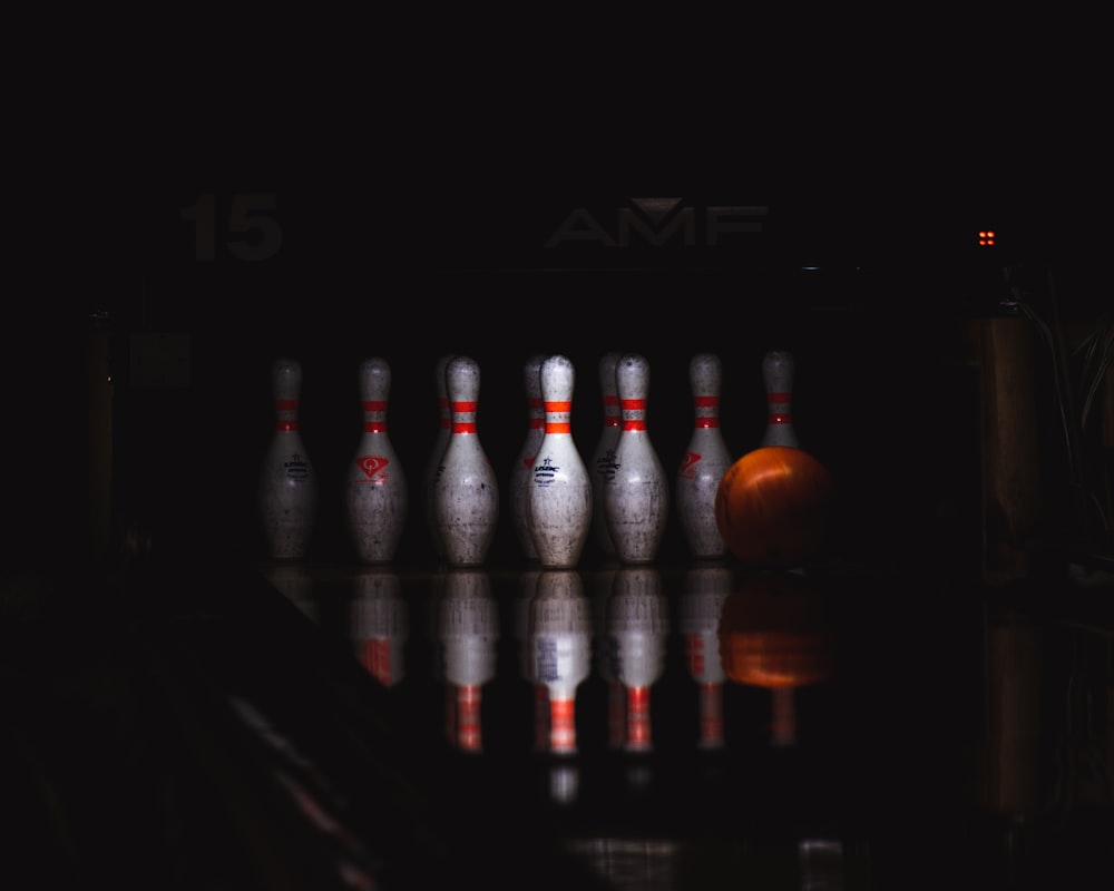 clear glass bottles on black table