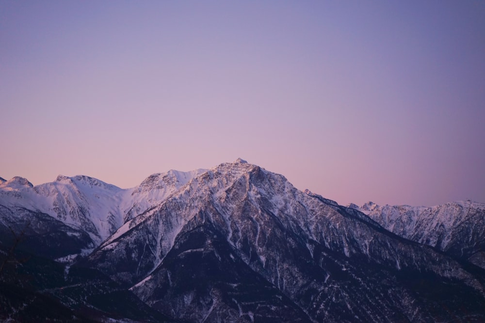 snow covered mountain during daytime