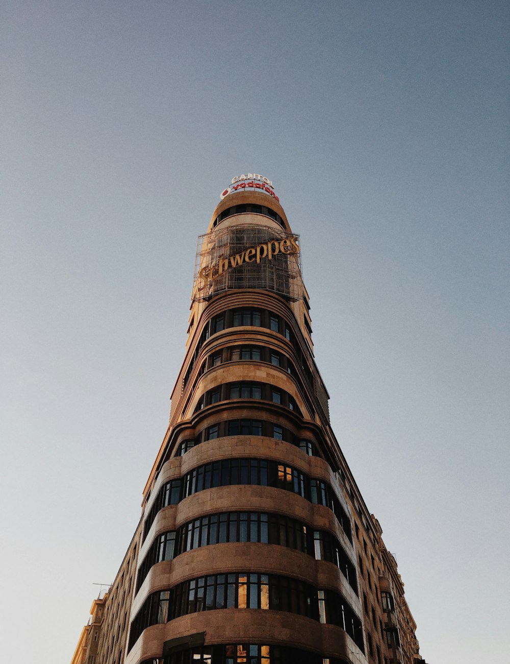 brown concrete building under blue sky during daytime