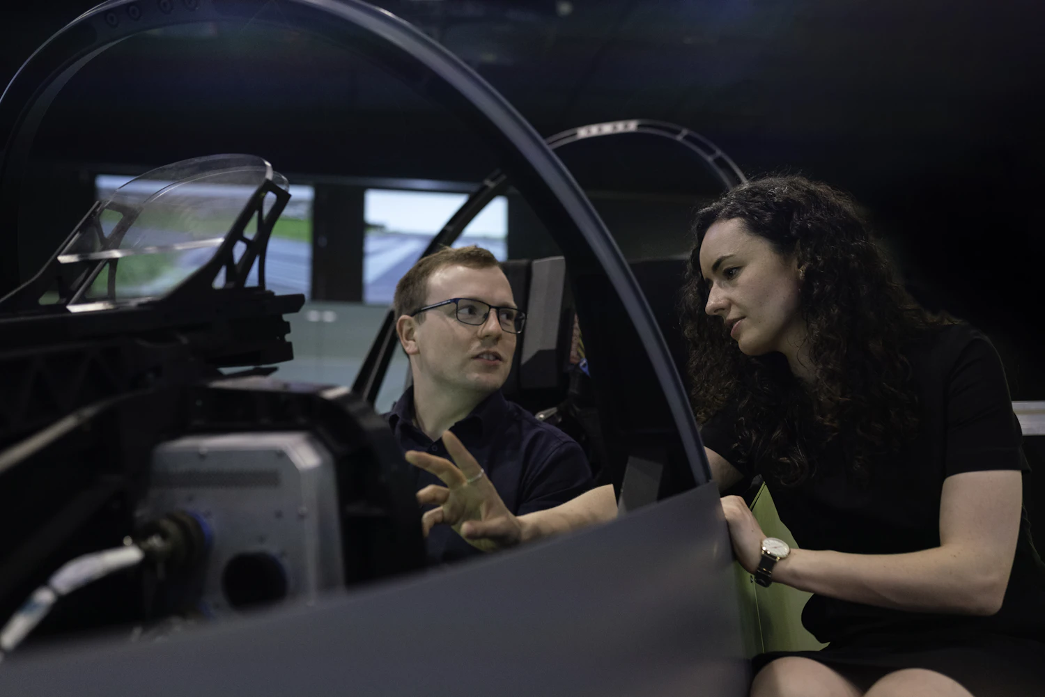 Aerospace engineer working in a flight simulator