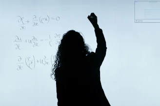 A confident GCSE maths influencer recording an engaging educational video with a whiteboard full of equations.