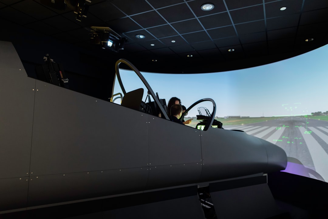 Female aerospace engineer conducts flight simulator
