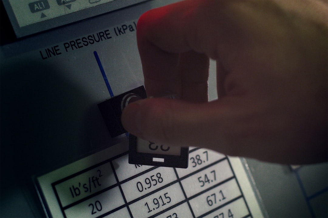 black and white number and number, Female aerospace engineer turns pressure key