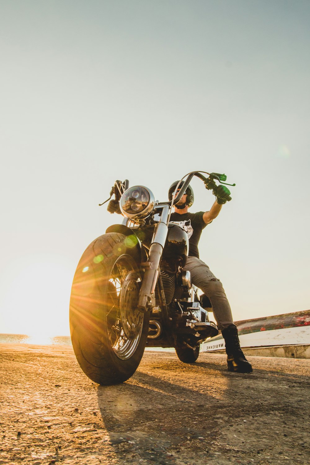 man in yellow helmet riding motorcycle during daytime