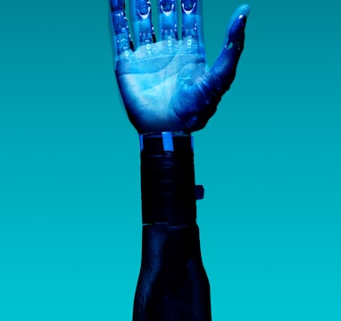 person holding blue light bulb