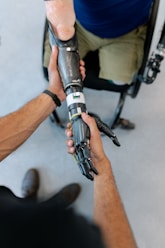person holding black and silver tube