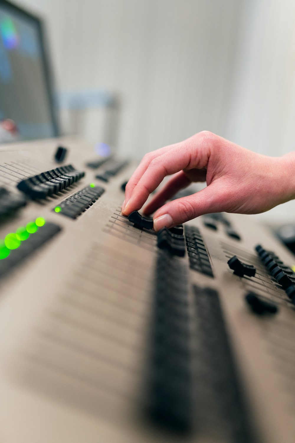 person playing black and white electric keyboard