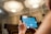 A home inspector examining a house with a digital tablet in hand.